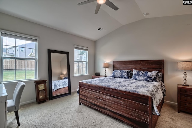 837 Marigold Ln, Lexington, SC 29072 - bedroom featuring light carpet, vaulted ceiling, multiple windows, and baseboards