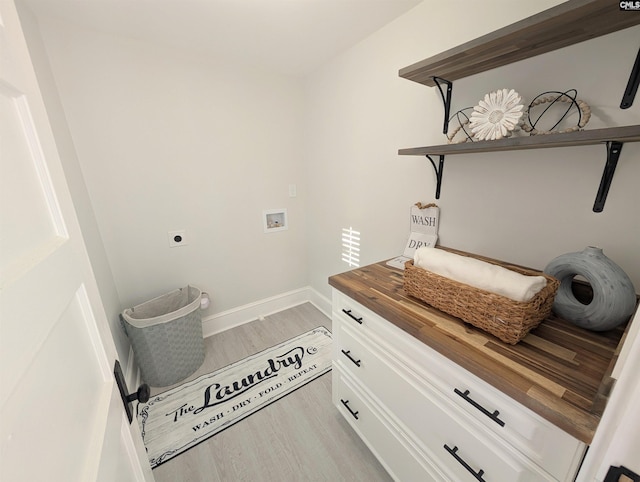 2710 Columbia Ave, Columbia, SC 29201 - washroom featuring washer hookup, light wood finished floors, electric dryer hookup, baseboards, and cabinet space