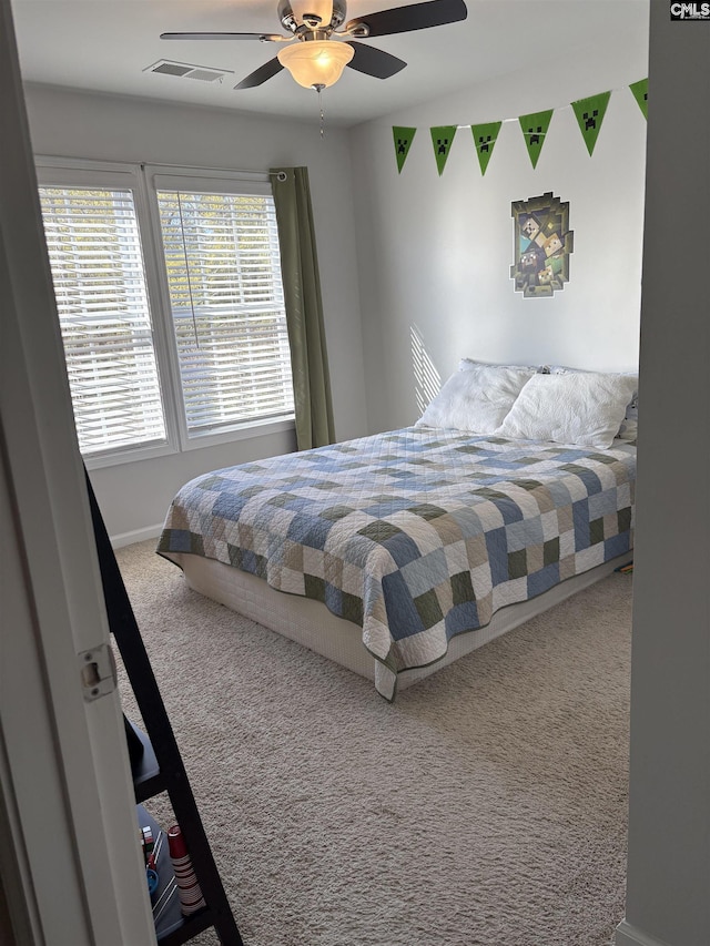 288 Links Crossing Dr, Blythewood, SC 29016 - bedroom with carpet, baseboards, and a ceiling fan