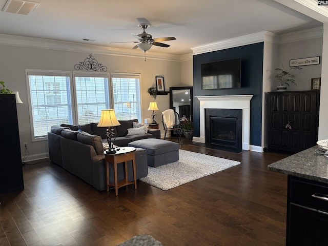 288 Links Crossing Dr, Blythewood, SC 29016 - living room featuring ceiling fan, plenty of natural light, dark wood-type flooring, and crown molding
