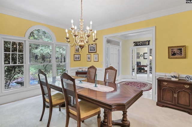 832 Longtown Rd, Blythewood, SC 29016 - dining room featuring a chandelier, crown molding, and wainscoting