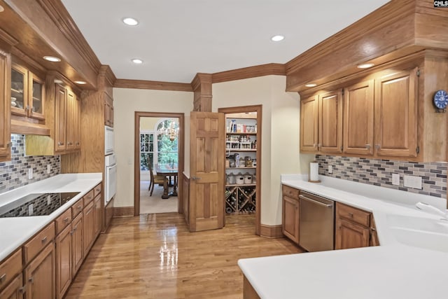 832 Longtown Rd, Blythewood, SC 29016 - kitchen with stainless steel dishwasher, oven, black electric cooktop, baseboards, and a sink