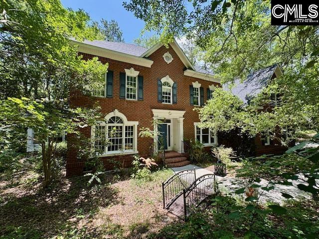 832 Longtown Rd, Blythewood, SC 29016 - colonial inspired home with brick siding and a gate