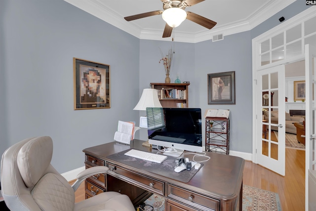 317 Cartgate Cir, Blythewood, SC 29016 - home office featuring a ceiling fan, crown molding, wood finished floors, french doors, and baseboards