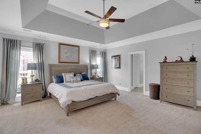 317 Cartgate Cir, Blythewood, SC 29016 - bedroom with crown molding, light colored carpet, a tray ceiling, baseboards, and ceiling fan