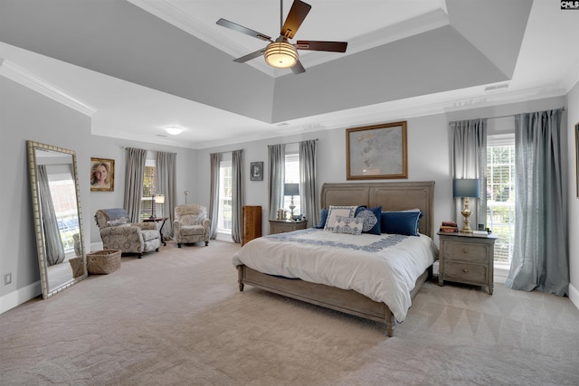 317 Cartgate Cir, Blythewood, SC 29016 - bedroom featuring crown molding, light carpet, a raised ceiling, a ceiling fan, and baseboards