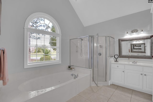 317 Cartgate Cir, Blythewood, SC 29016 - bathroom with tile patterned floors, vanity, a jetted tub, a stall shower, and lofted ceiling