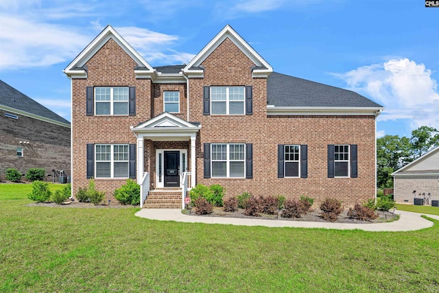 1412 Hammerwood Ln, Westminster, SC 29170 - view of front of house featuring a front lawn, brick siding, and roof with shingles