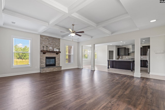1412 Hammerwood Ln, Westminster, SC 29170 - unfurnished living room featuring wood finished floors, ceiling fan, coffered ceiling, beamed ceiling, and baseboards