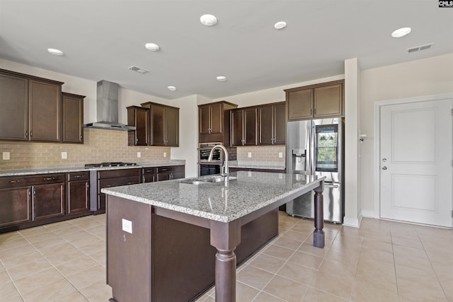 1412 Hammerwood Ln, Westminster, SC 29170 - kitchen with stainless steel appliances, wall chimney range hood, a sink, a breakfast bar area, and backsplash