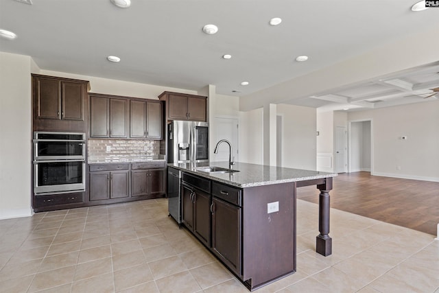 1412 Hammerwood Ln, Westminster, SC 29170 - kitchen with a sink, a breakfast bar area, stainless steel appliances, beam ceiling, and light stone countertops
