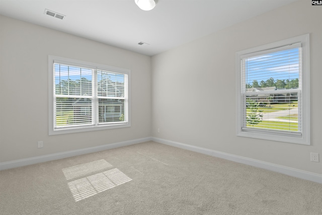 1412 Hammerwood Ln, Westminster, SC 29170 - spare room featuring light carpet, healthy amount of natural light, and baseboards