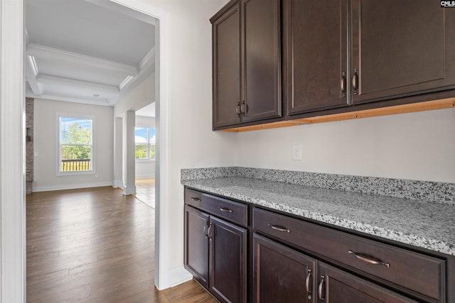 1412 Hammerwood Ln, Westminster, SC 29170 - kitchen with crown molding, dark brown cabinets, beamed ceiling, dark wood-style flooring, and light stone countertops