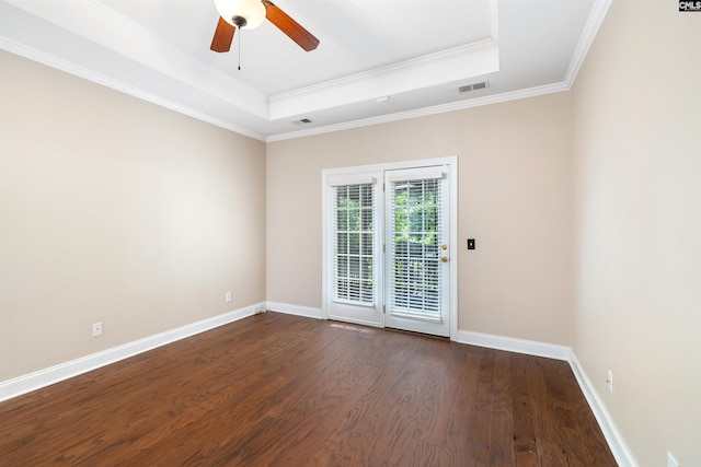 560 Park Place Dr, Elgin, SC 29045 - unfurnished room with a raised ceiling, dark wood-type flooring, ceiling fan, baseboards, and ornamental molding