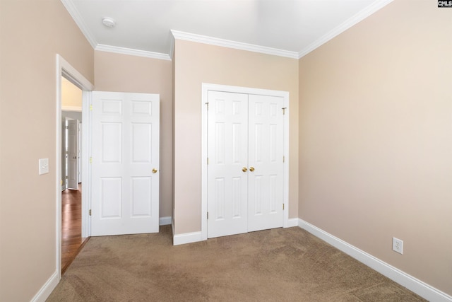 560 Park Place Dr, Elgin, SC 29045 - unfurnished bedroom featuring ornamental molding, carpet, a closet, and baseboards