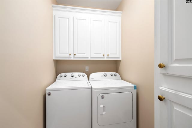 560 Park Place Dr, Elgin, SC 29045 - washroom with washer and dryer and cabinet space