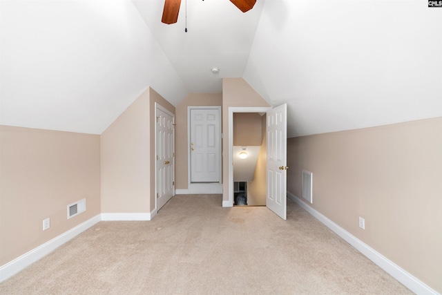 560 Park Place Dr, Elgin, SC 29045 - additional living space with ceiling fan, light carpet, lofted ceiling, and baseboards