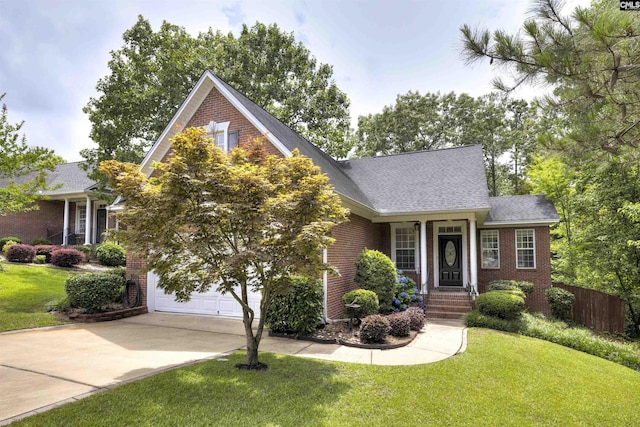 560 Park Place Dr, Elgin, SC 29045 - view of front facade with brick siding, concrete driveway, a shingled roof, and an attached garage