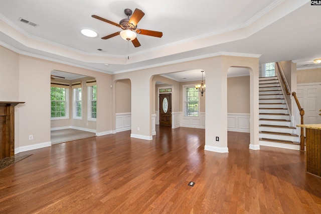 560 Park Place Dr, Elgin, SC 29045 - unfurnished living room with arched walkways, plenty of natural light, wood finished floors, ceiling fan, and ornamental molding