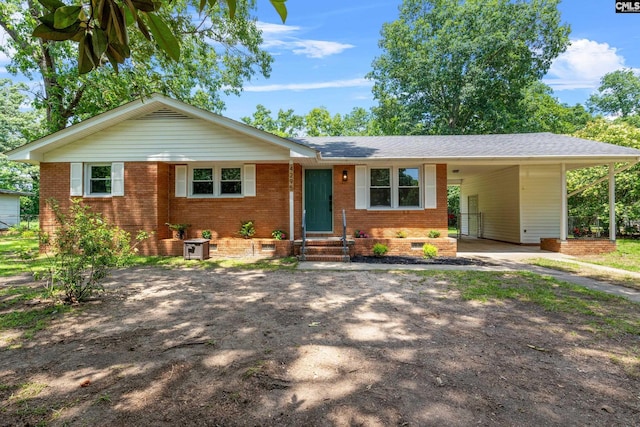 4295 Dorsey Dr, Sumter, SC 29154 - single story home featuring asphalt driveway, brick siding, a carport, and roof with shingles