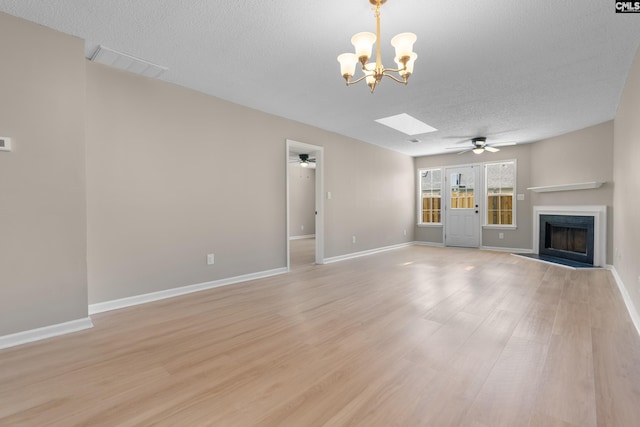 110 Walking Horse Way, Columbia, SC 29223 - unfurnished living room with ceiling fan, a textured ceiling, a chandelier, light wood finished floors, and a fireplace