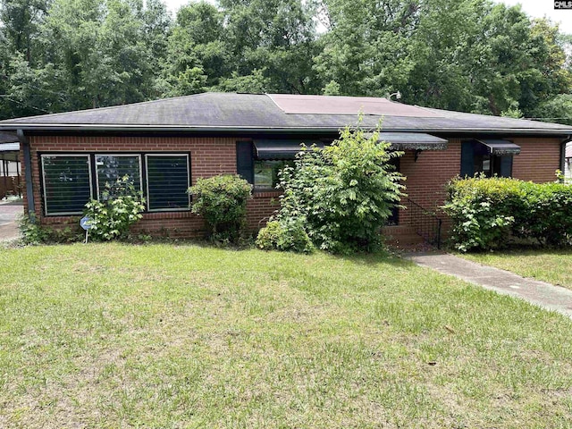 325 Beltline Ave, Batesburg, SC 29006 - view of front of home featuring brick siding and a front lawn