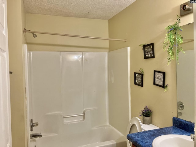 829 Martha St, Columbia, SC 29203 - full bath with a textured ceiling, vanity, shower / tub combination, and toilet