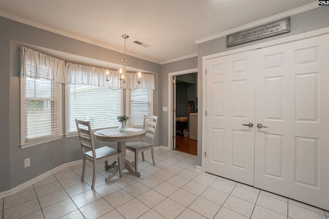 285 Freedom Blvd, Sumter, SC 29154 - dining room featuring a chandelier, crown molding, light tile patterned floors, and baseboards