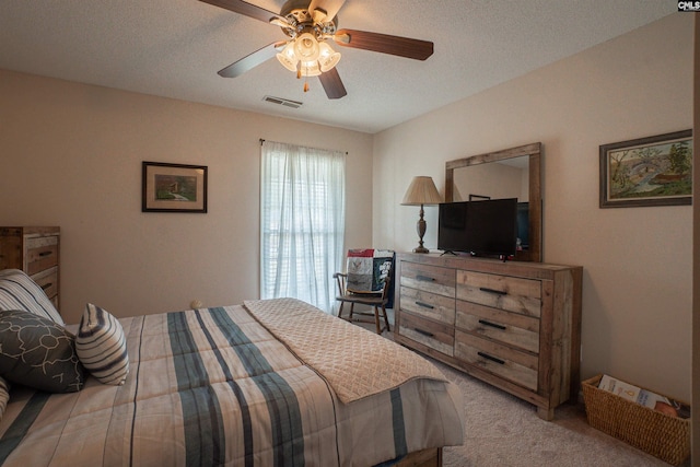 285 Freedom Blvd, Sumter, SC 29154 - bedroom featuring ceiling fan, carpet, and a textured ceiling