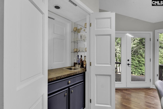 1305 Forest View Rd, Conway, SC 29526 - indoor wet bar featuring lofted ceiling and wood finished floors