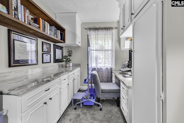 1305 Forest View Rd, Conway, SC 29526 - carpeted office space featuring a textured ceiling and built in study area