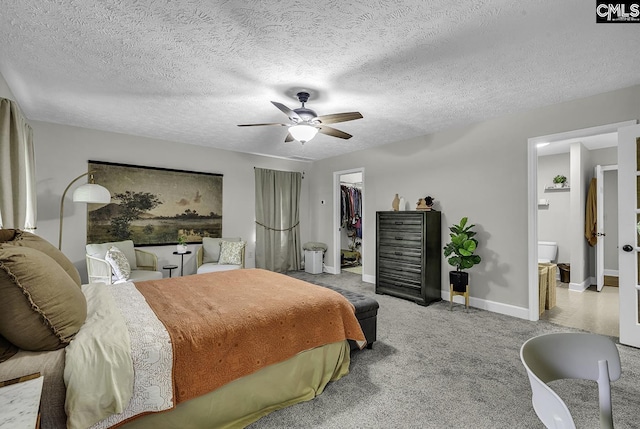 1305 Forest View Rd, Conway, SC 29526 - bedroom featuring a walk in closet, a closet, carpet flooring, baseboards, and ceiling fan