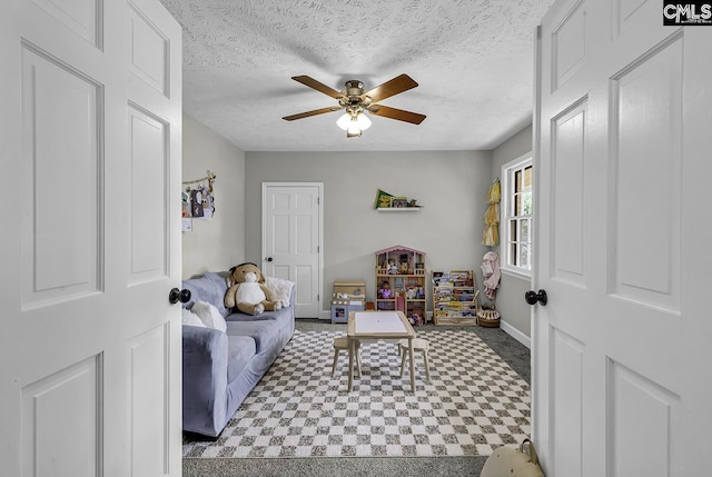 1305 Forest View Rd, Conway, SC 29526 - living room featuring tile patterned floors, ceiling fan, a textured ceiling, and baseboards