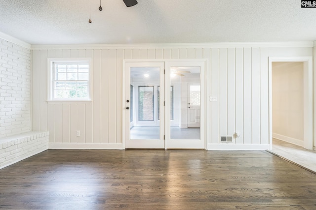 6307 Whiteoak Rd, Columbia, SC 29206 - unfurnished room with ceiling fan, crown molding, wood finished floors, a textured ceiling, and baseboards