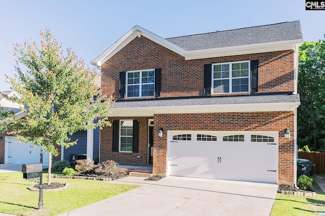 179 Marissa Ln, Lexington, SC 29072 - traditional-style home with brick siding, driveway, a garage, a front yard, and roof with shingles