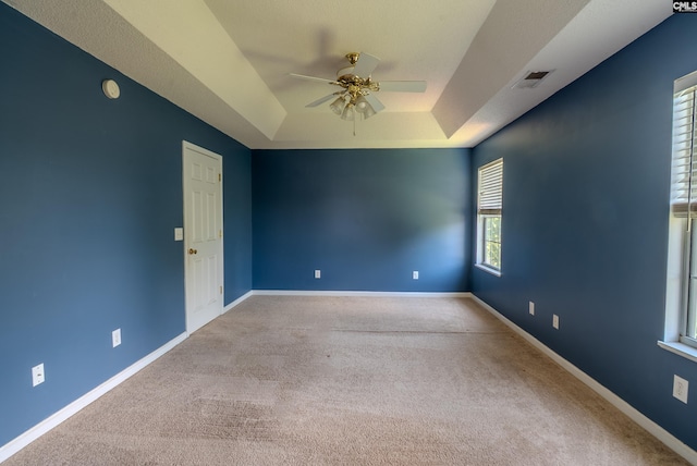 105 Songbird Ct, Chapin, SC 29036 - carpeted spare room featuring a raised ceiling, a ceiling fan, and baseboards