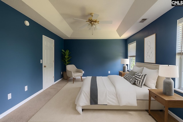 105 Songbird Ct, Chapin, SC 29036 - carpeted bedroom featuring a tray ceiling, baseboards, and ceiling fan