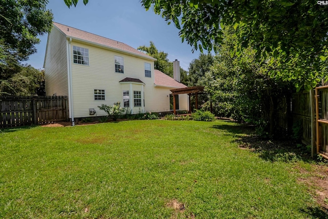 105 Songbird Ct, Chapin, SC 29036 - rear view of house with a chimney
