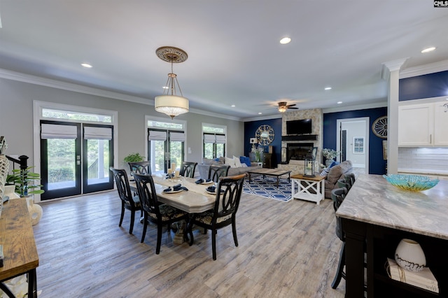 1111 High Valley Trl, Blythewood, SC 29016 - dining space with recessed lighting, light wood finished floors, a large fireplace, crown molding, and a ceiling fan