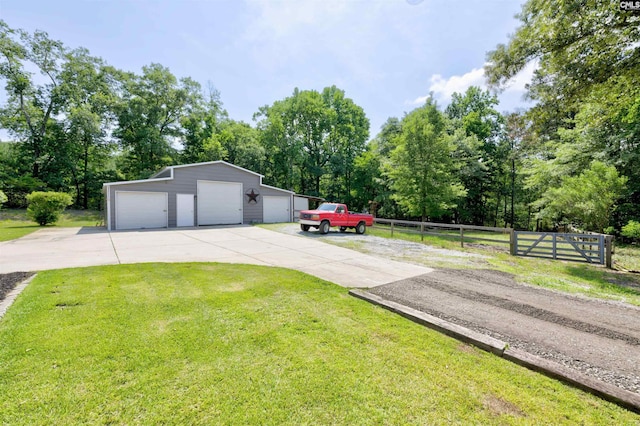 1111 High Valley Trl, Blythewood, SC 29016 - view of front of home featuring a detached garage, an outbuilding, and view of wooded area