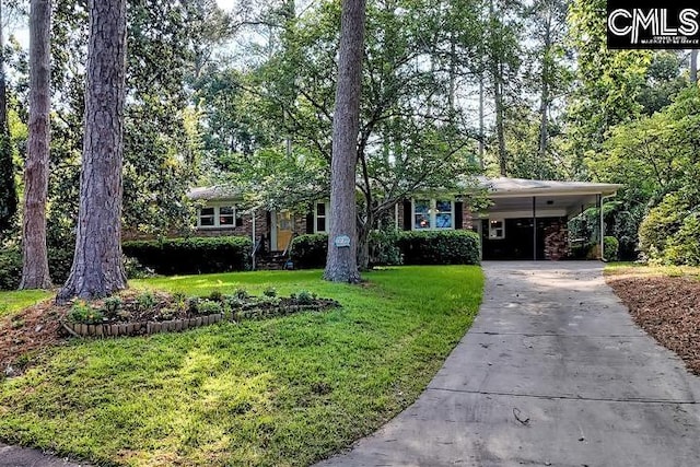 127 Lake Elizabeth Dr, Columbia, SC 29203 - view of front facade featuring driveway, a front yard, a carport, and brick siding
