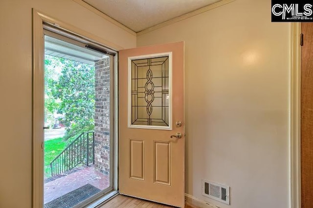 127 Lake Elizabeth Dr, Columbia, SC 29203 - entryway featuring ornamental molding and light wood finished floors