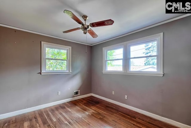 127 Lake Elizabeth Dr, Columbia, SC 29203 - spare room with a ceiling fan, baseboards, ornamental molding, and wood finished floors