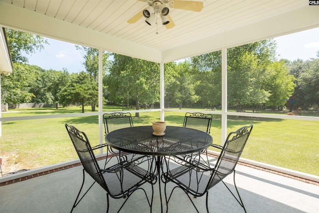 1109 Church St, West Columbia, SC 29172 - view of patio featuring ceiling fan, view of scattered trees, and outdoor dining area