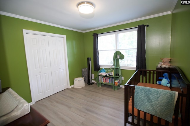 100 Hill Springs Ct, Lexington, SC 29073 - bedroom featuring wood finished floors, ornamental molding, a closet, and baseboards
