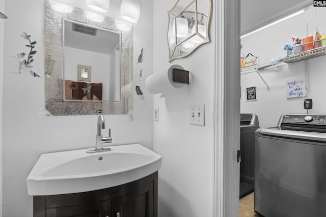 300 Green Rose, Columbia, SC 29229 - bathroom featuring a sink and washer and dryer