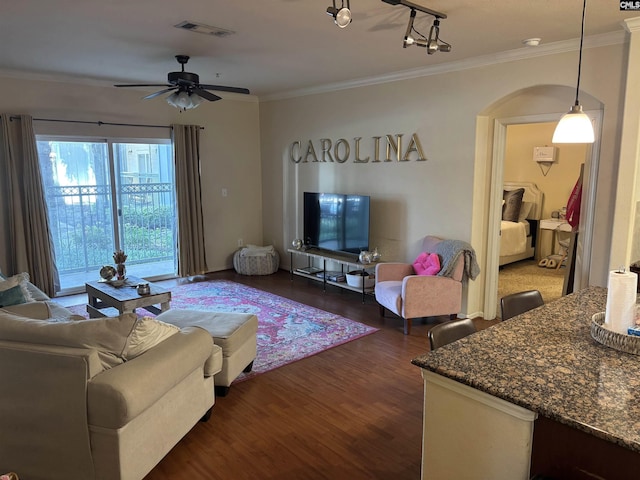 1085 Shop Rd Unit 117, Columbia, SC 29201 - living room with dark wood-type flooring, arched walkways, crown molding, and a ceiling fan