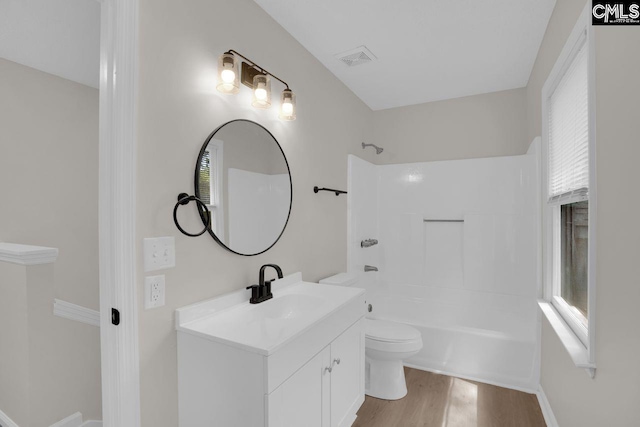 204 Sandcreek Dr, Winnsboro, SC 29180 - full bathroom featuring toilet, vanity, wood finished floors, and shower / bath combination