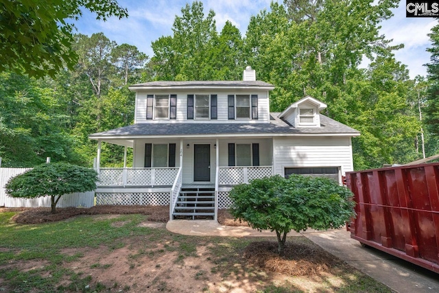 204 Sandcreek Dr, Winnsboro, SC 29180 - view of front facade featuring covered porch, a chimney, a garage, and roof with shingles