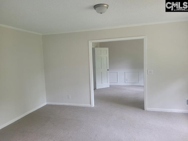 361 Wycombe St, Columbia, SC 29212 - carpeted empty room featuring crown molding, a textured ceiling, and baseboards